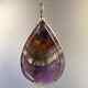Super 7 ('Soulite') pendant (w red, gold, clear, and purple) healing crystal
